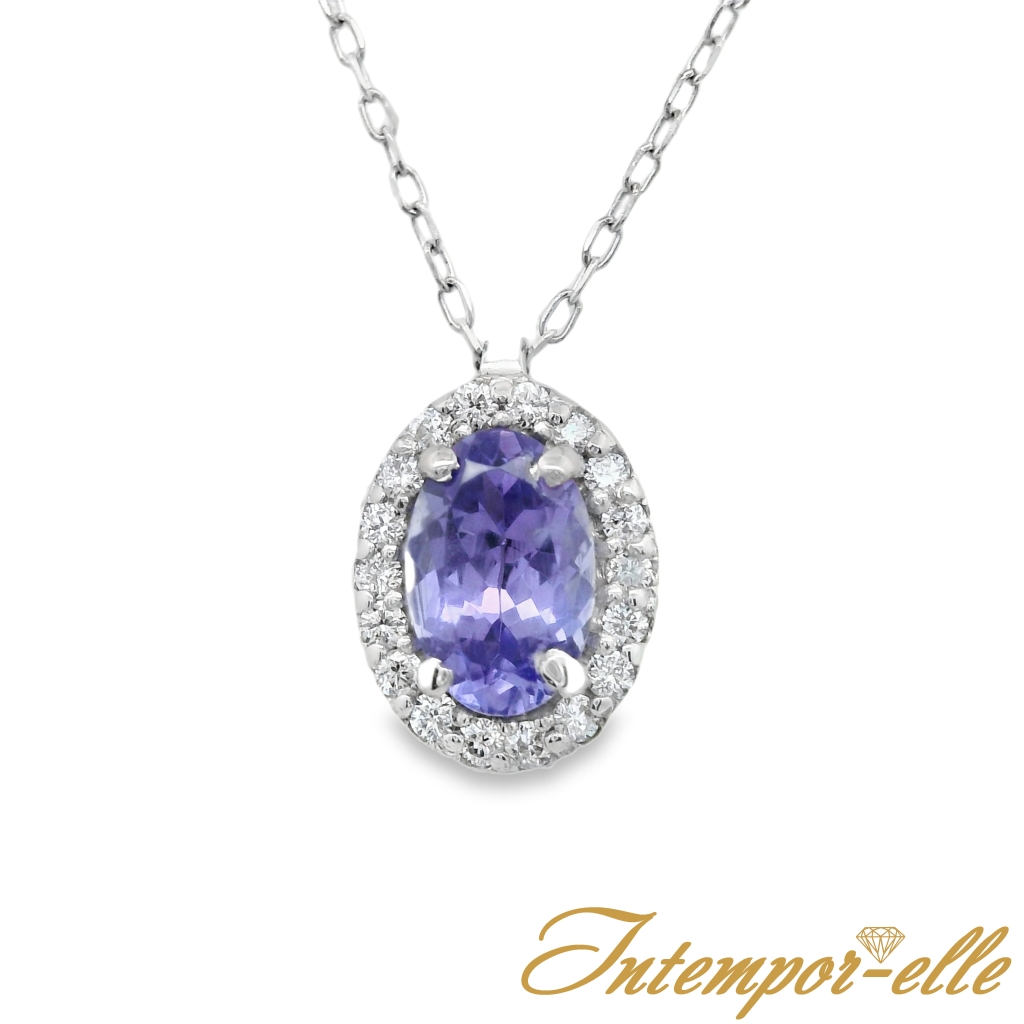 CL OR 18 CT TANZANITE OVAL + DT 0.14 CT 